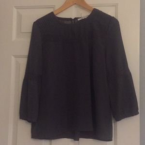 Blouse with lace detail on front, sleeves and back
